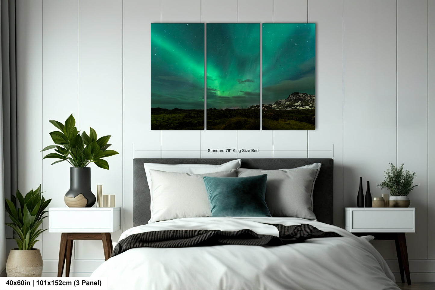a bed room with a neatly made bed and a painting on the wall