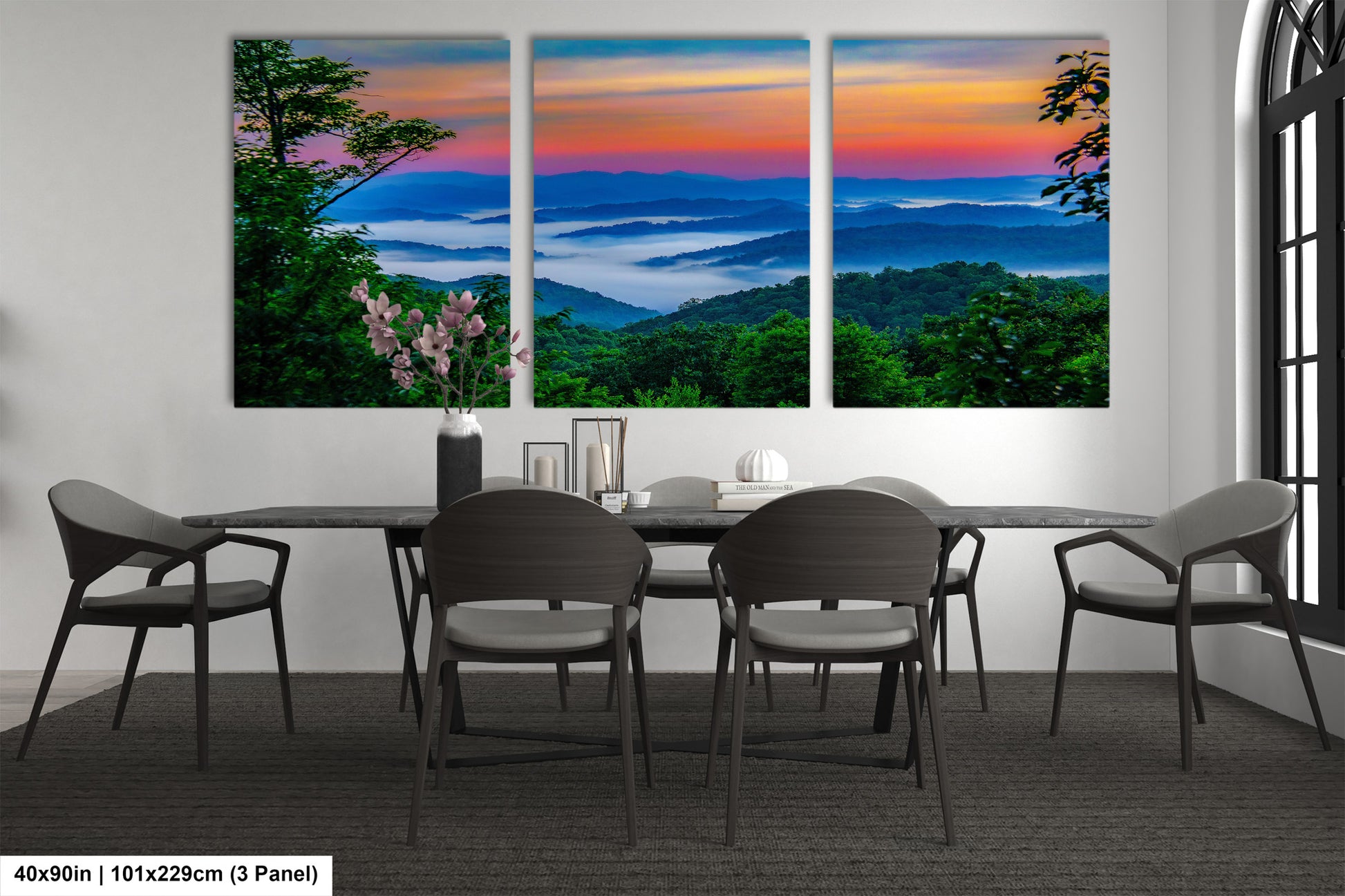 a dining room with a table and four chairs