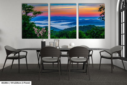 a dining room with a table and four chairs