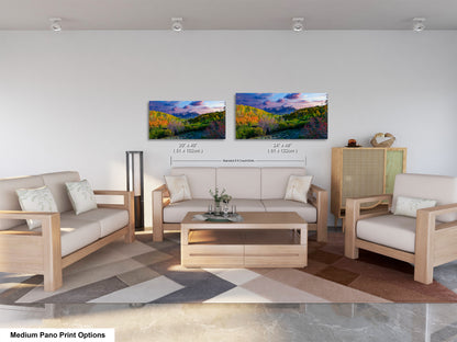 a living room filled with furniture and a painting on the wall