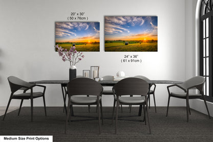 a dining room table with chairs and a vase of flowers