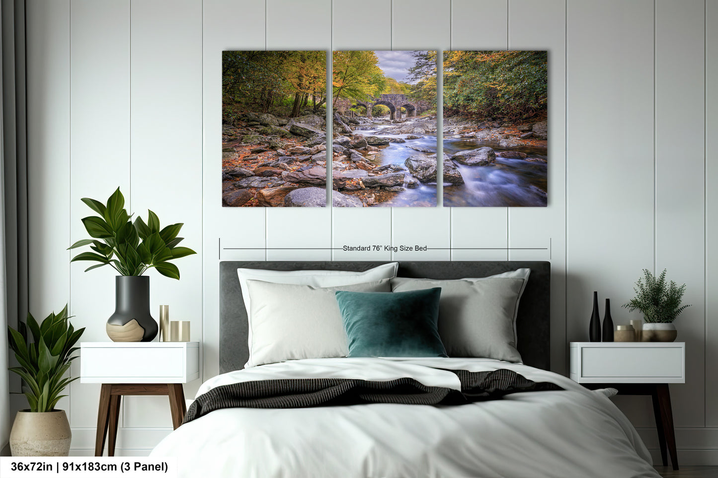 a bedroom with a bed and a painting on the wall