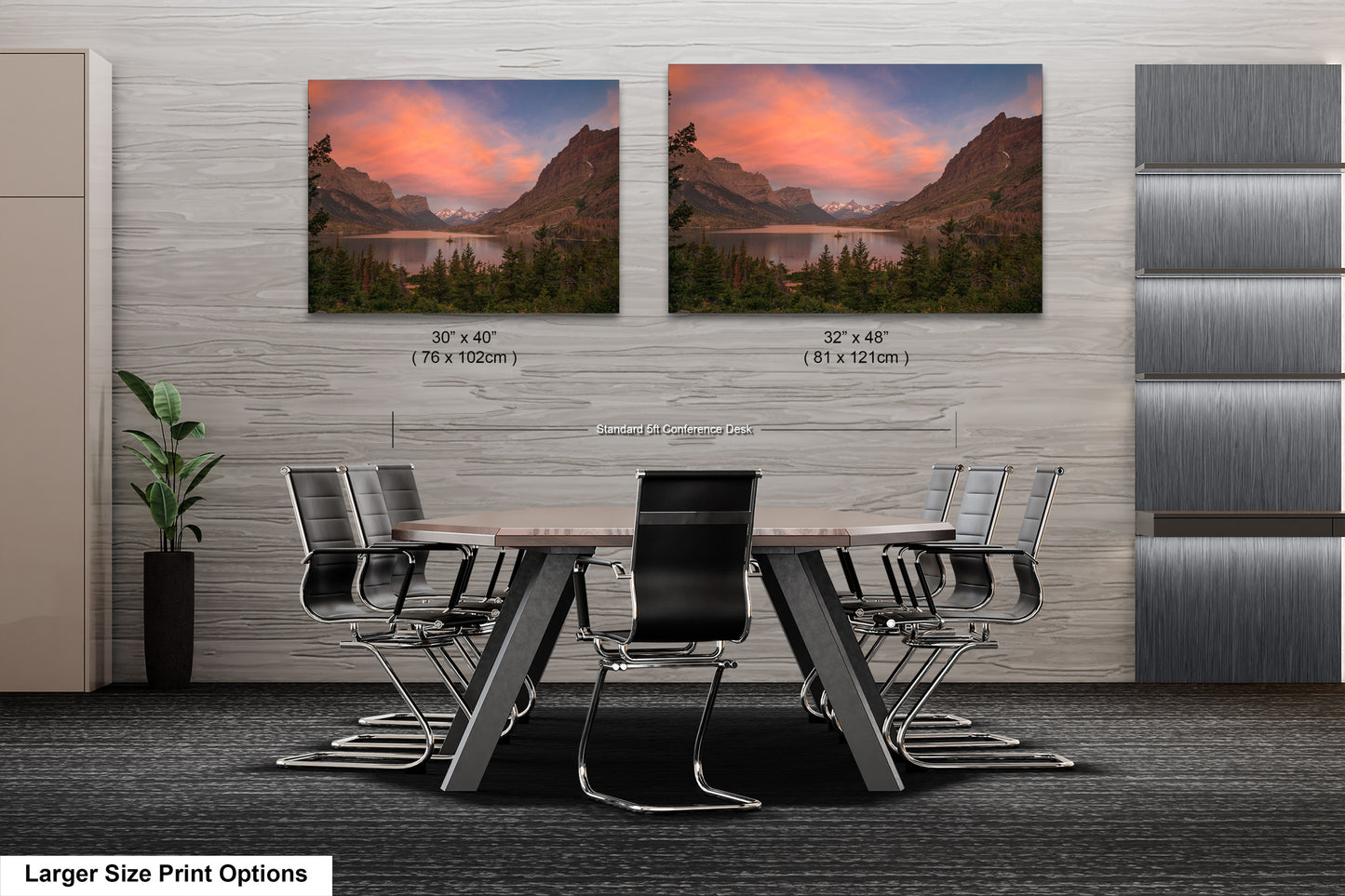 a dining room table with chairs and two pictures on the wall
