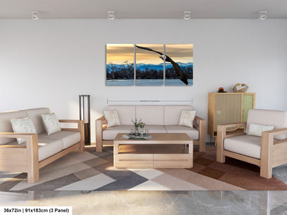 a living room filled with furniture and a painting on the wall