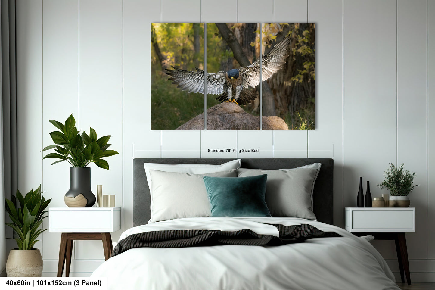 The image is a bedroom with a large bed, nightstands, and a potted plant. Above the bed, there is a large framed print depicting a bird with outstretched wings.