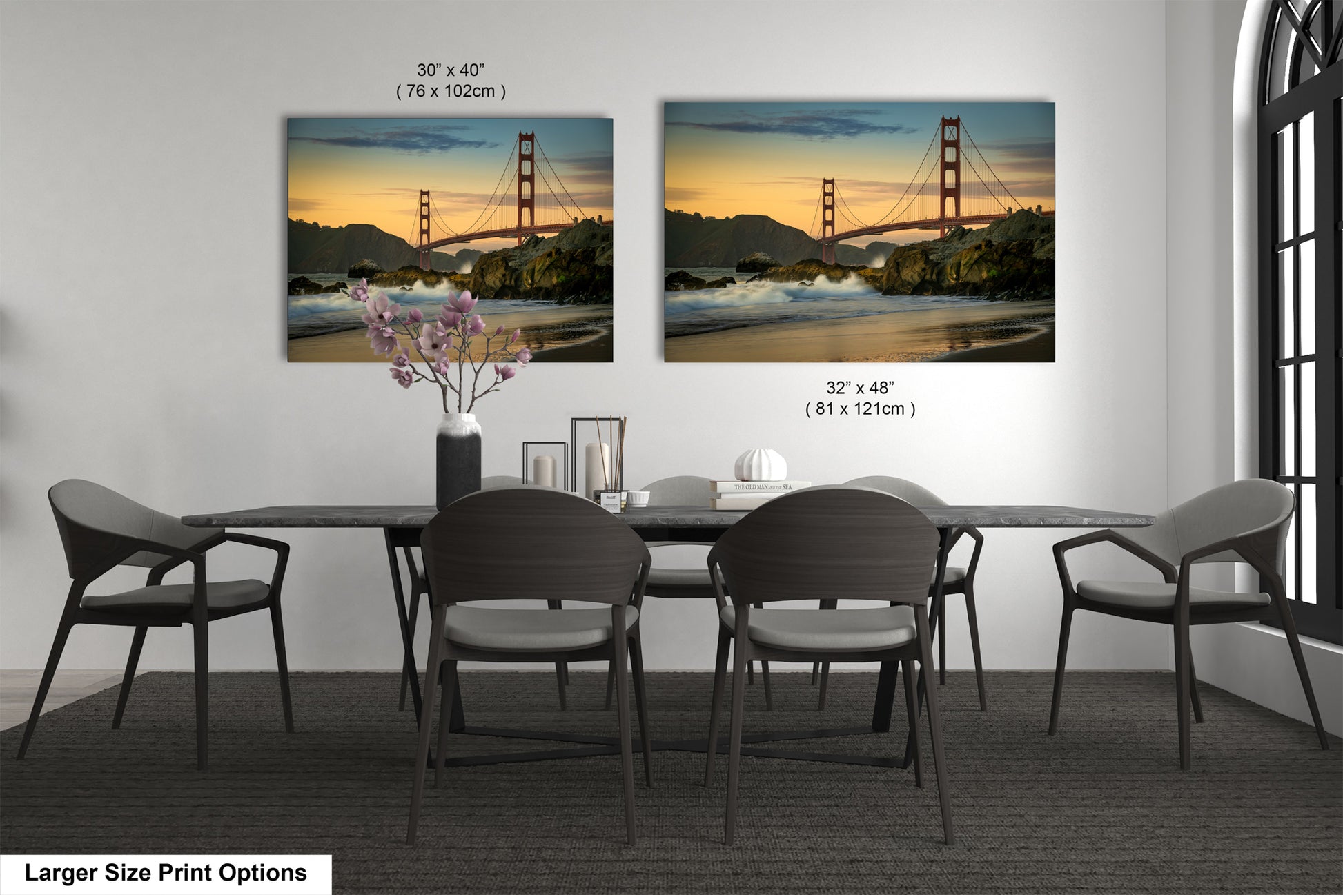 a dining room table with four chairs and a vase of flowers
