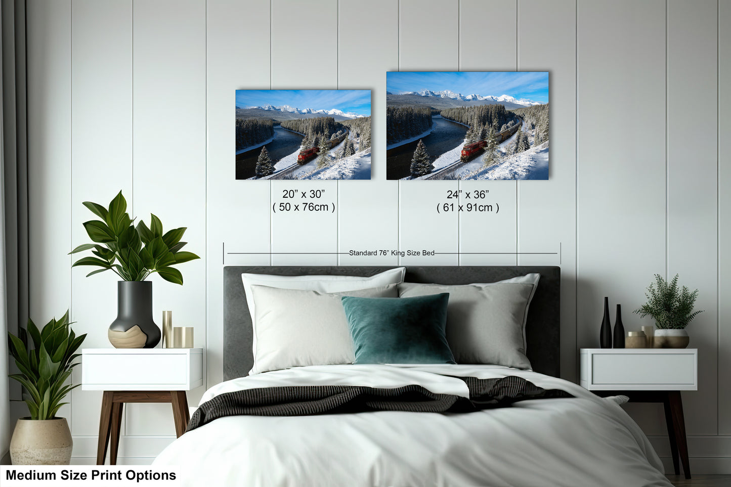a bedroom with a bed, nightstands, and potted plants. There are two framed landscape photographs hanging on the wall above the bed, depicting snowy mountains and a train. The photographs are of medium size, with dimensions of 20 x 30" (50 x 70") and 24 x 36" (61 x 91") respectively.