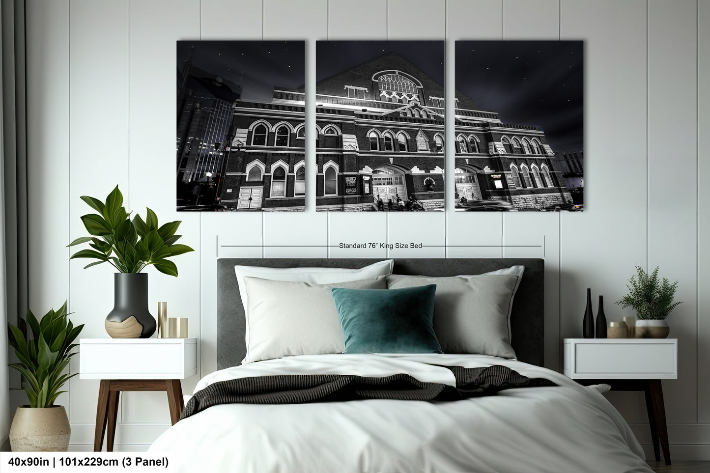 a hotel room with a bed and a plant