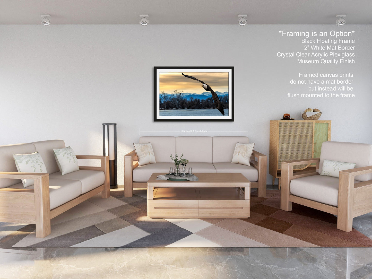 a living room filled with furniture and a painting on the wall
