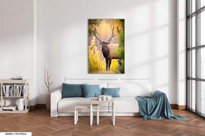 a living room with a couch and a painting on the wall