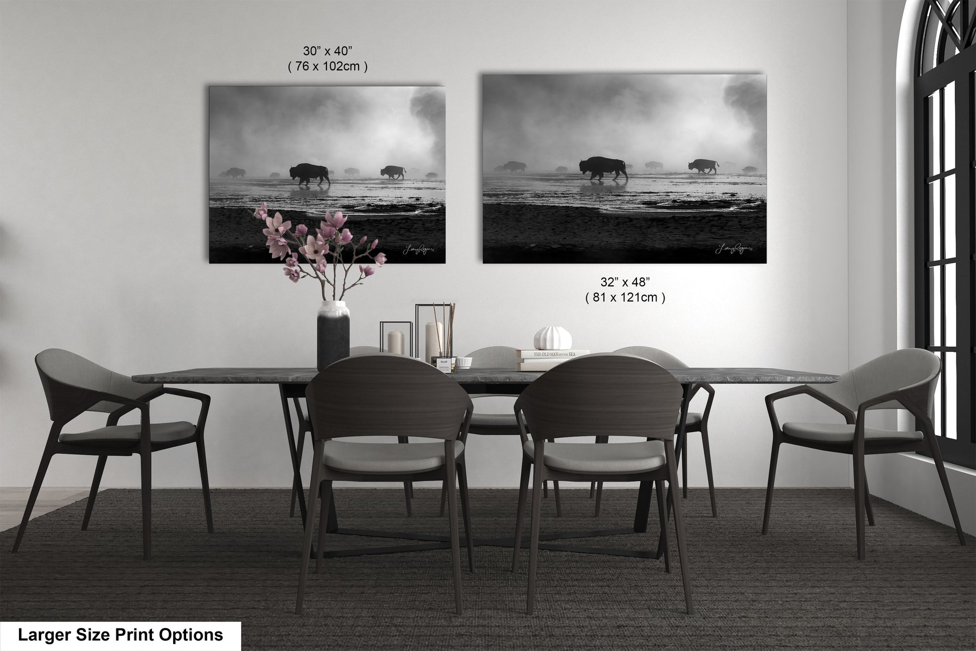 a black and white photo of a dining room table