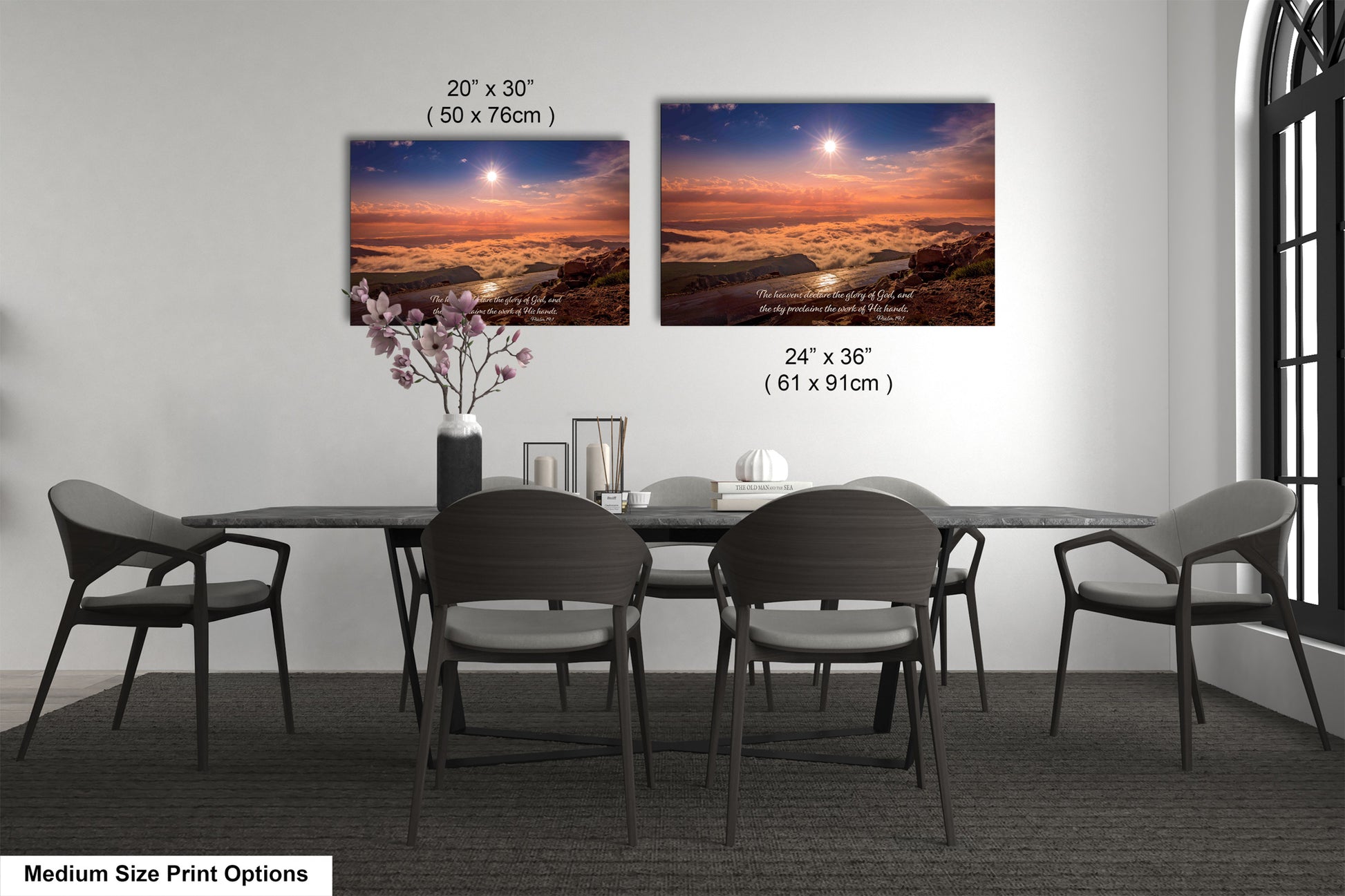 a dining table with four chairs and a vase of flowers