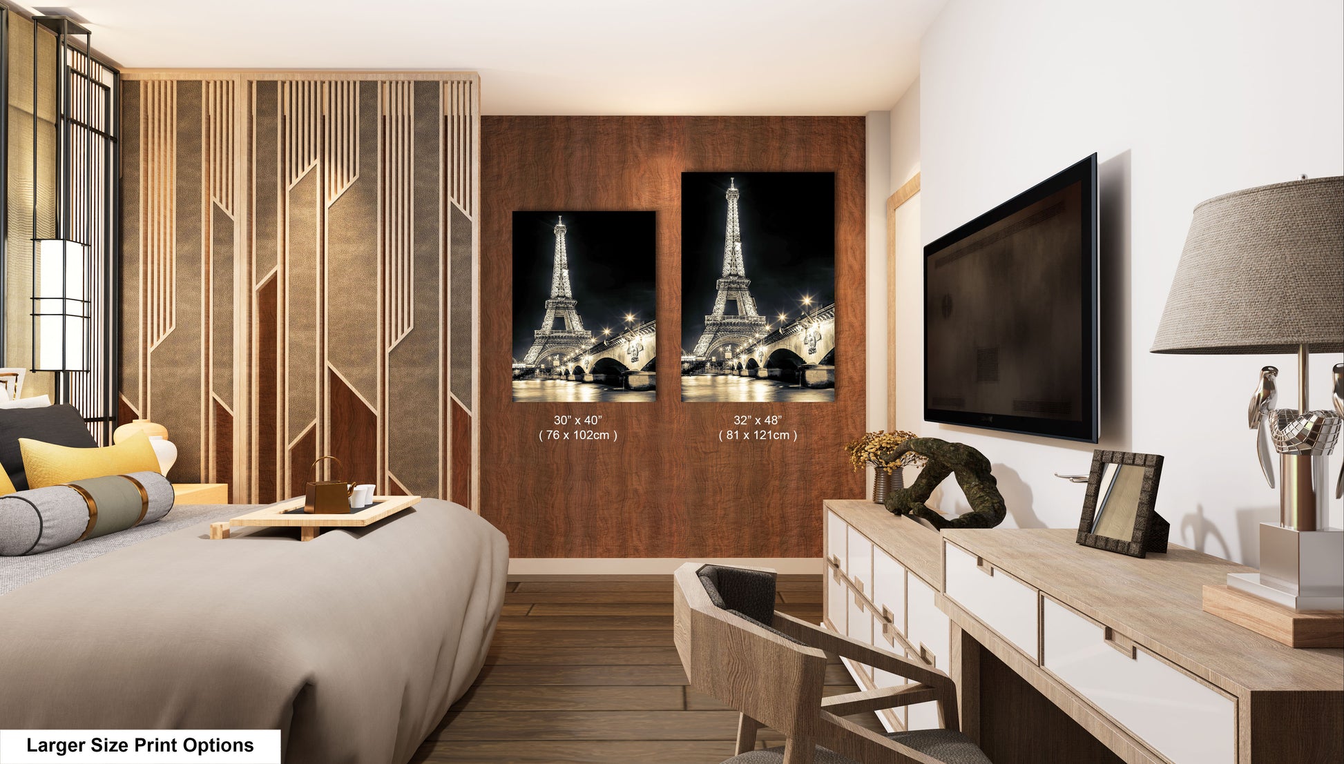 a room with a bed, desk, television and a picture of the eiff