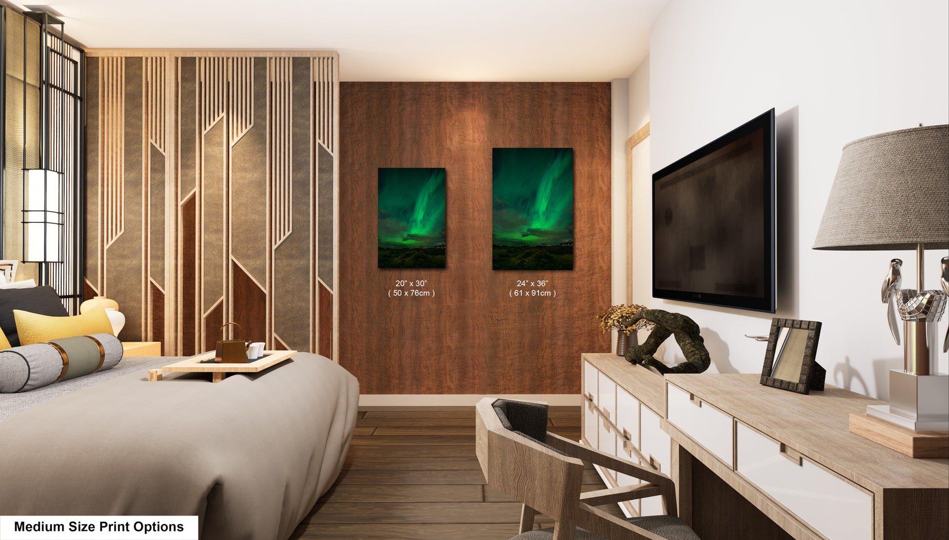 a modern bedroom with a large bed, a wooden dresser, and a television mounted on the wall. There are two framed pictures of the Aurora Borealis, or Northern Lights, hanging on the wall.