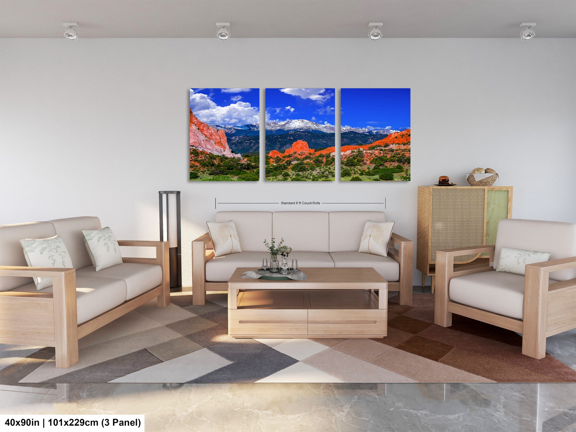 a living room filled with furniture and a painting on the wall