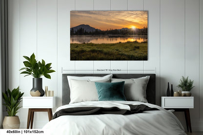 a bedroom with a bed and a painting on the wall