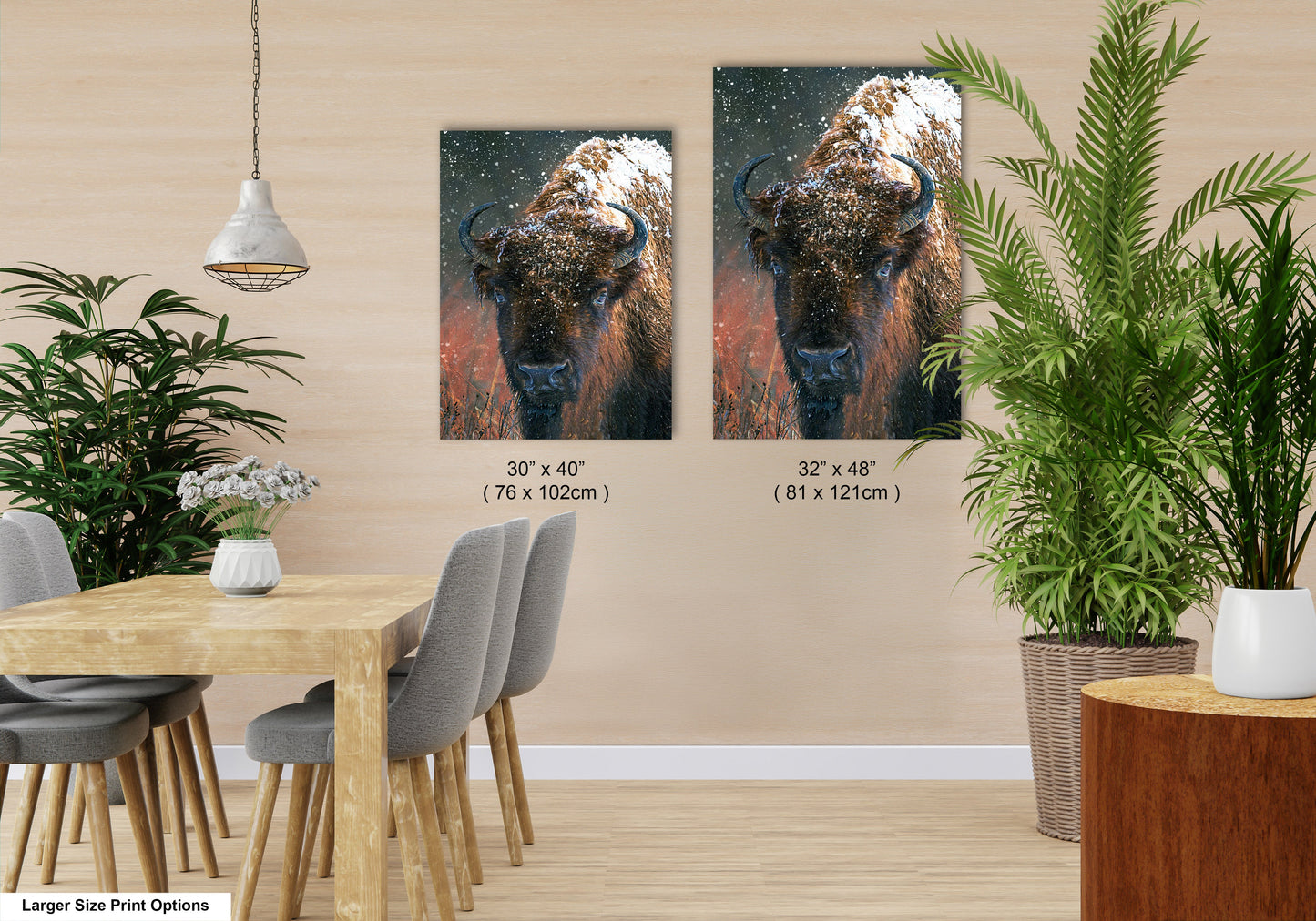 a room with a table and chairs and two pictures on the wall