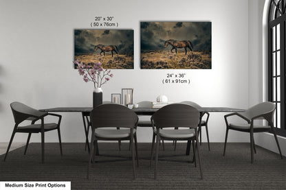 a dining room table with chairs and a vase of flowers