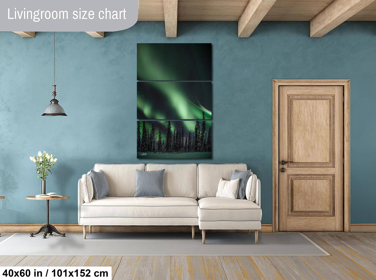 a living room with a couch and a painting on the wall