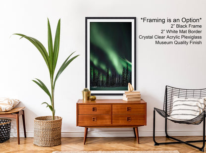 a living room with a chair and a painting on the wall